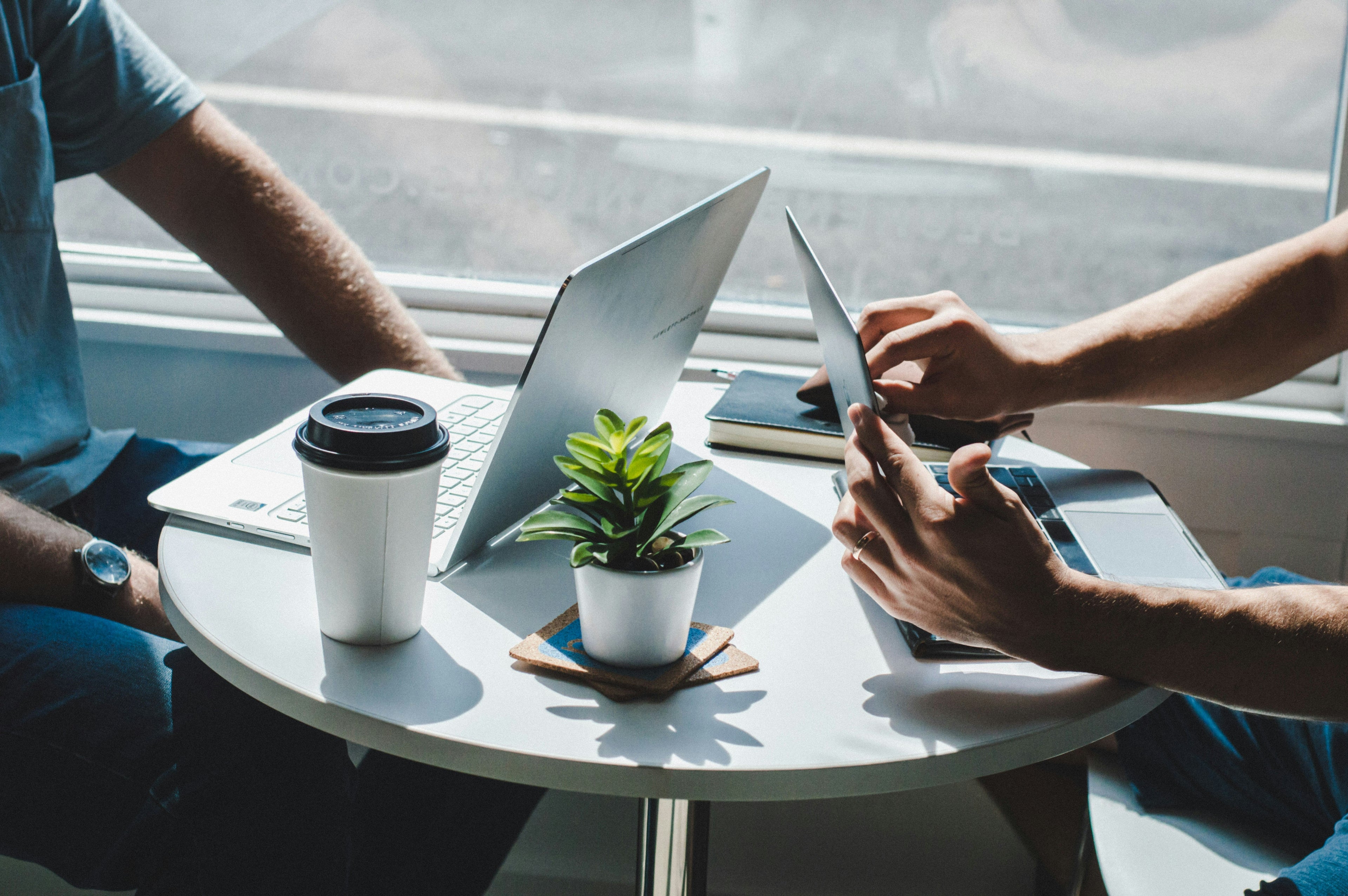 consultant talking analytics to business owner